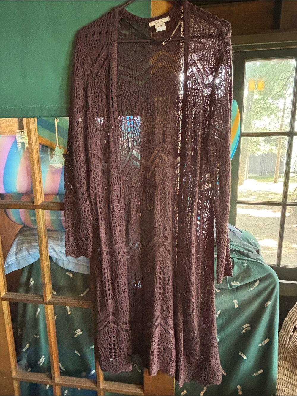 Ariat Openwork Crochet Cardigan in dark brown.